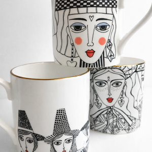 Ceramic mugs with stylised faces